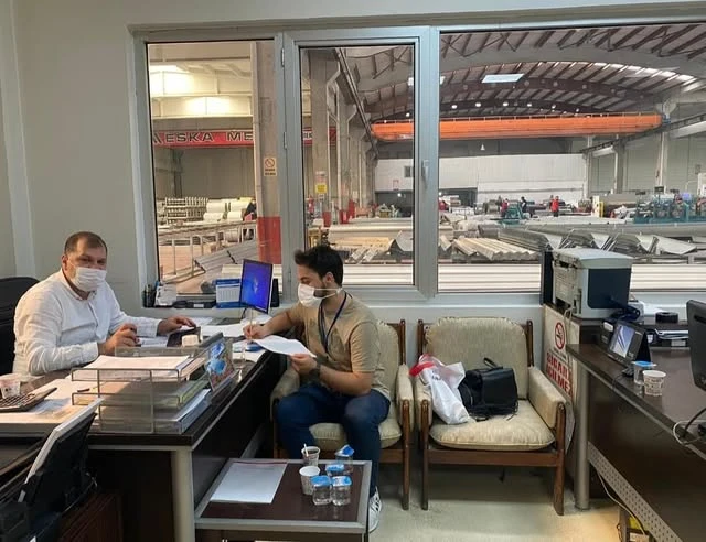 Meeting at a production plant